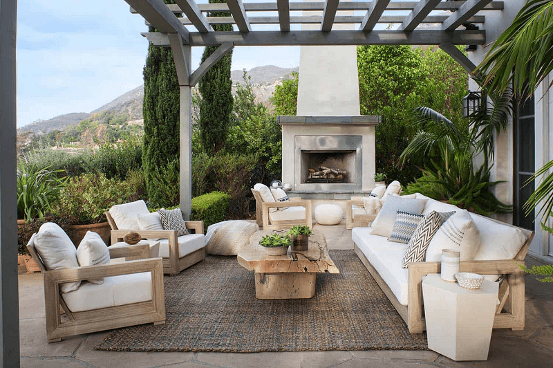 modern-patio-with-built-in-fireplace-and-mountain-views