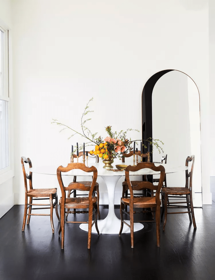 how-to-Set-Decorating-Project-Priorities-to-Get-Started-tulip-table-traditional-chairs-dining-room