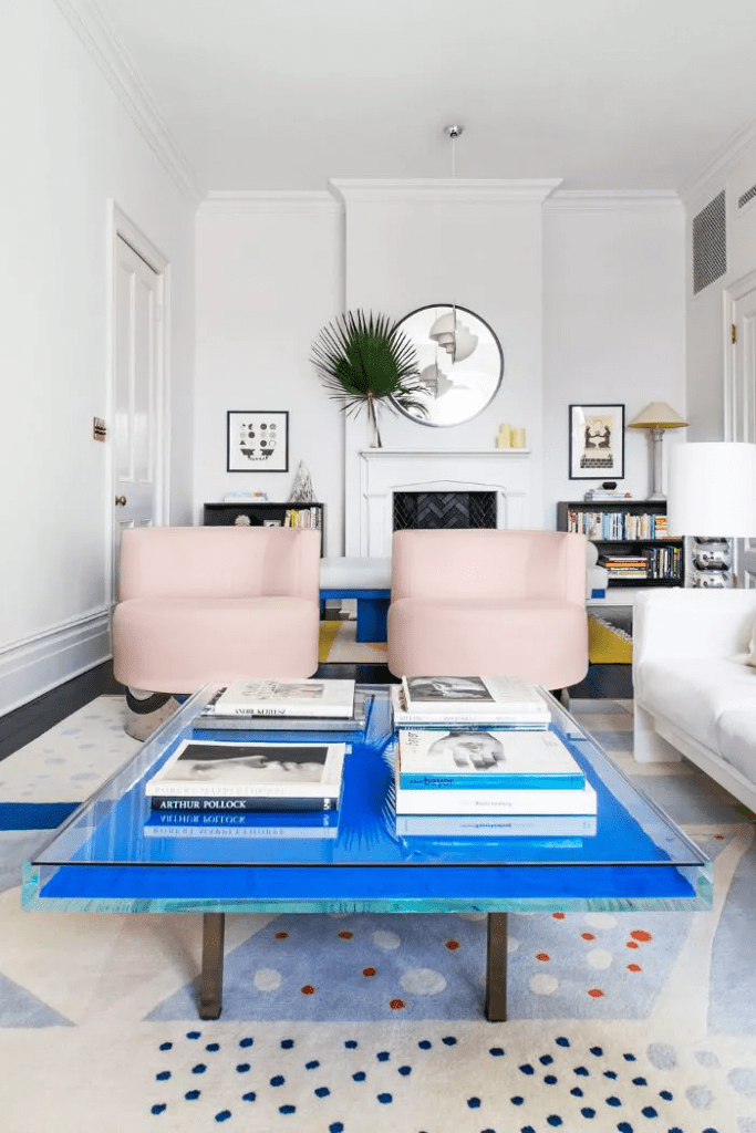 how-to-Set-Decorating-Project-Priorities-to-Get-started-pink-armchairs-modern-living-room