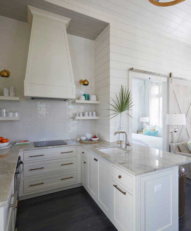 Shiplap-coastal-decor-style-kitchen-with-a-cohesive-color-scheme