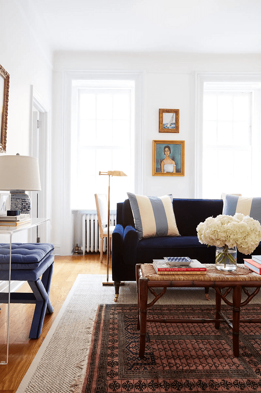 13-Best-Ways-to-Style-a-Living-Room-Like-a-Pro-organized-clean-living-room-with-blue-velvet-sofa