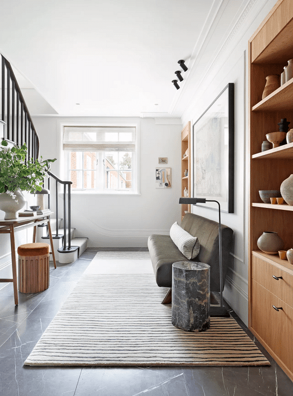 7-Essentials-for-a-Stylish-and-Functional-Entryway-foyer-with-greenery